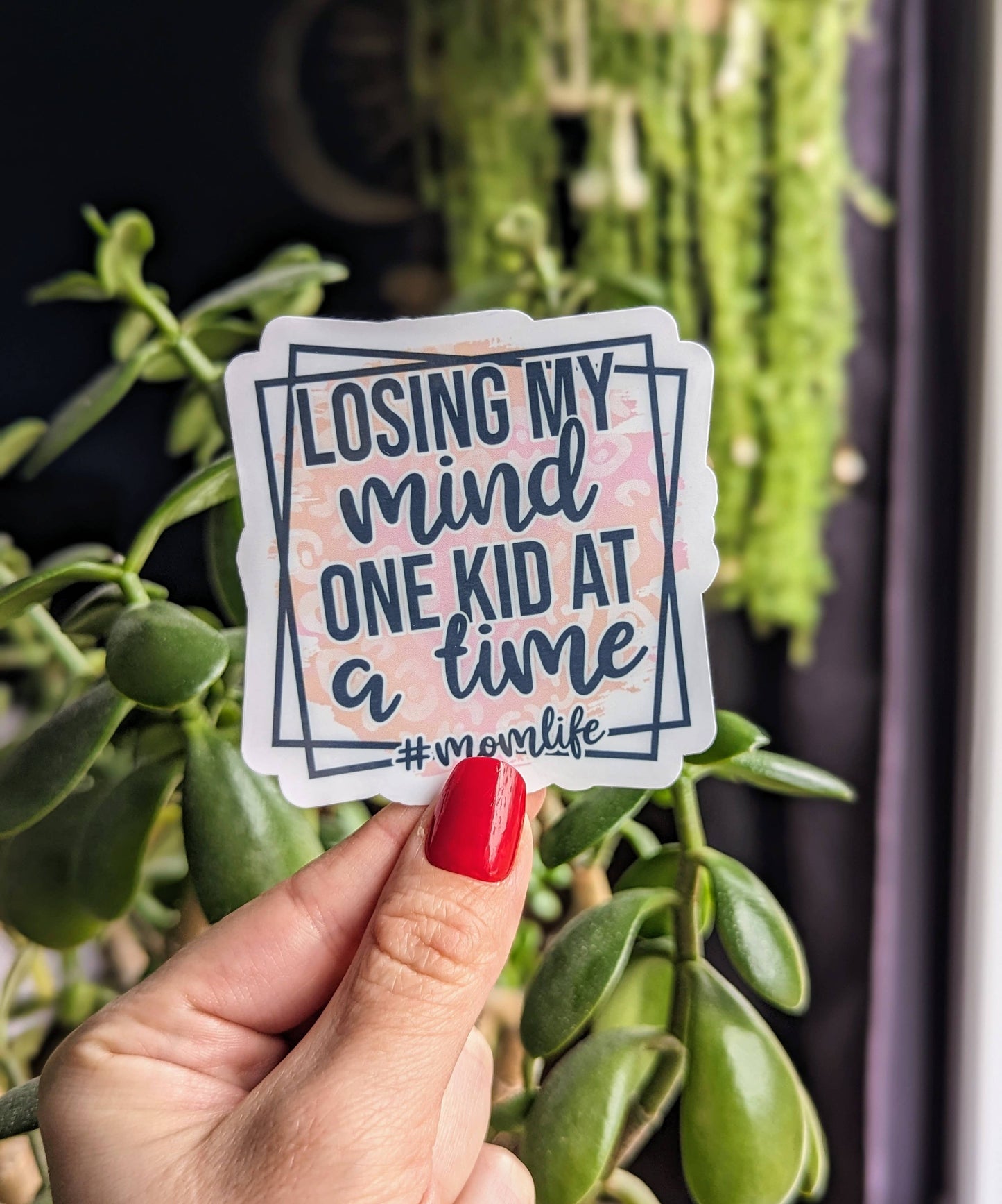 Losing my mind one kid at a time sticker
