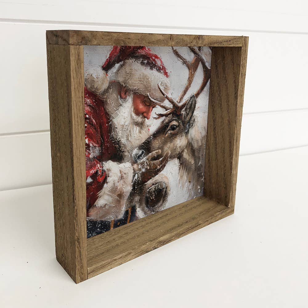 Santa Holding Reindeer -